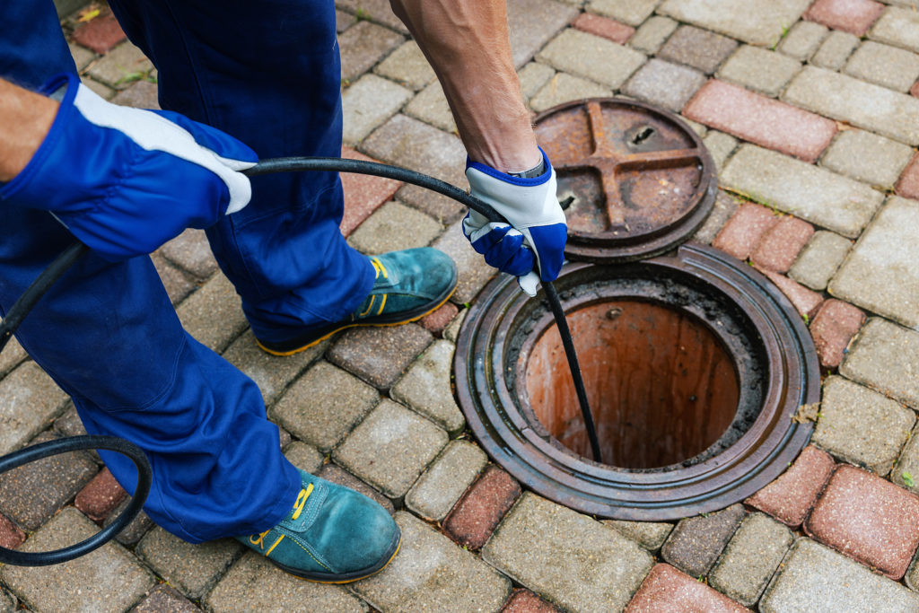 bigstock Sewer Cleaning Service Worke 459233511